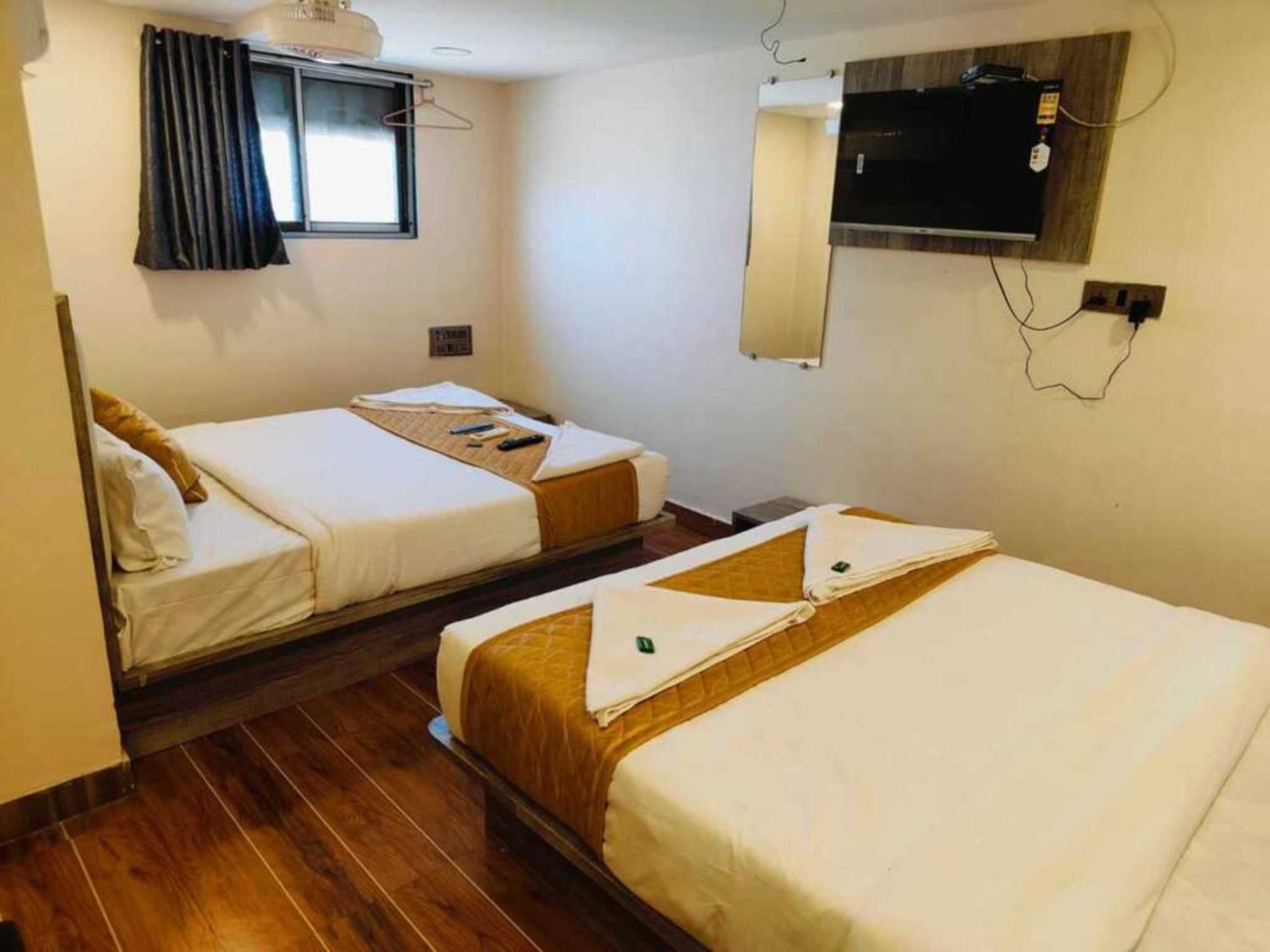 Hotel Pride Suites - Kurla West Мумбай Екстериор снимка